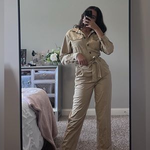 tan colored button up jumpsuit